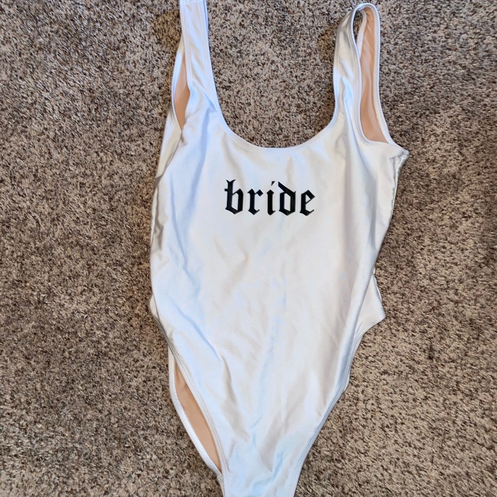 Bride one piece. Worn once. In perfect condition.